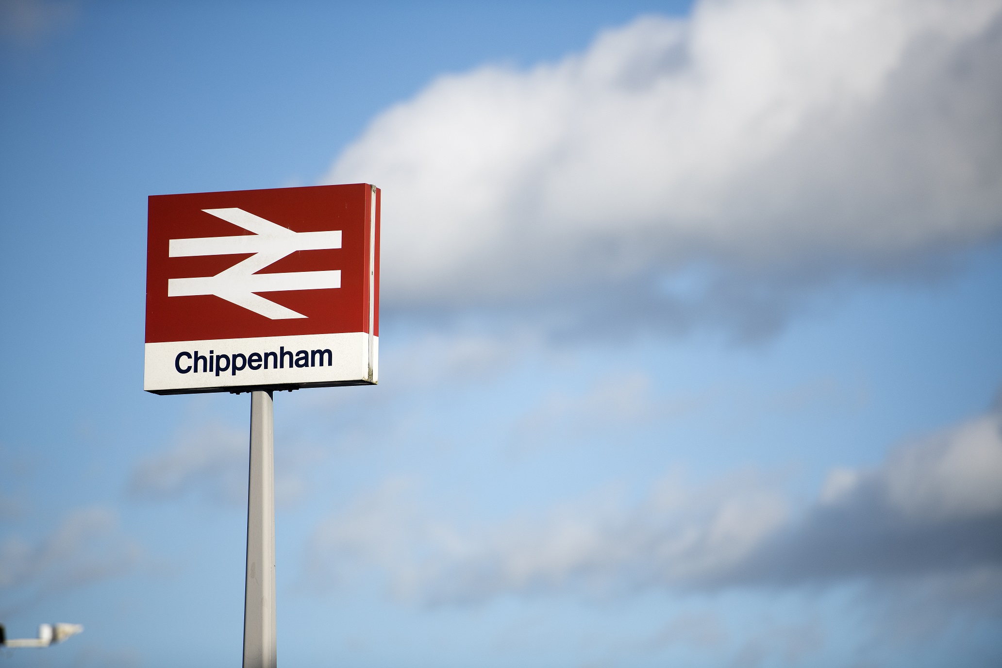 Outside view of Chippenham railway station sign.