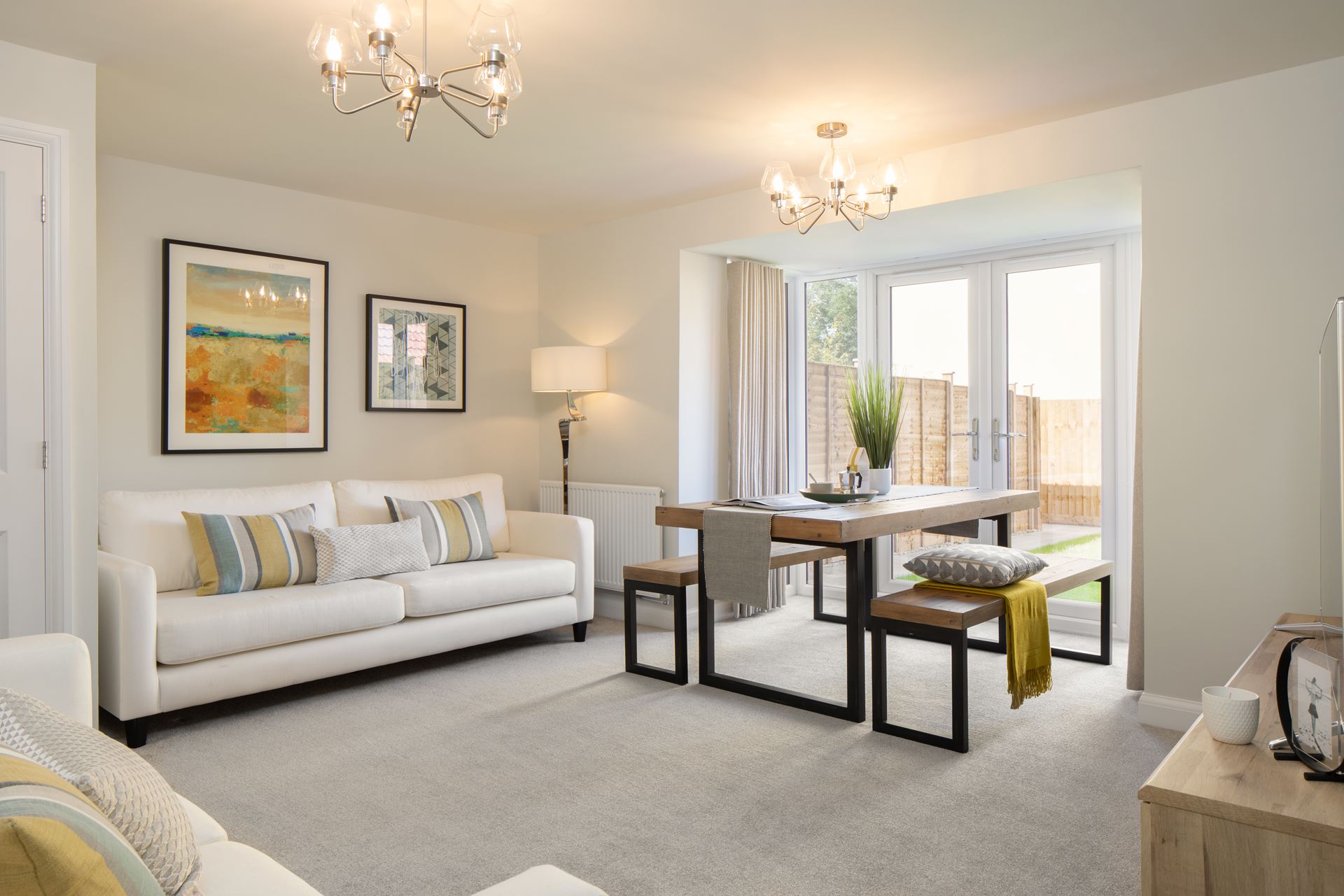 Image of the open plan lounge/diner of the Woodcote Show Home at Park Farm, Thornbury
