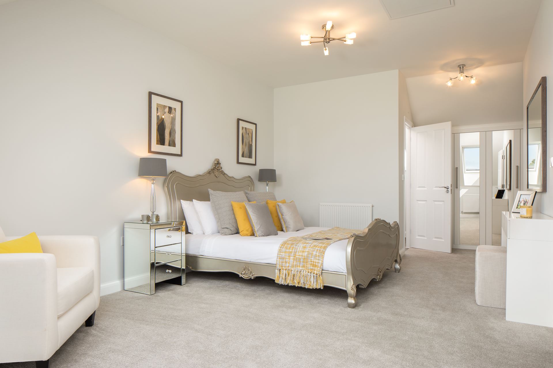 En suite master bedroom in the Woodcote Show Home at Park Farm, Thornbury