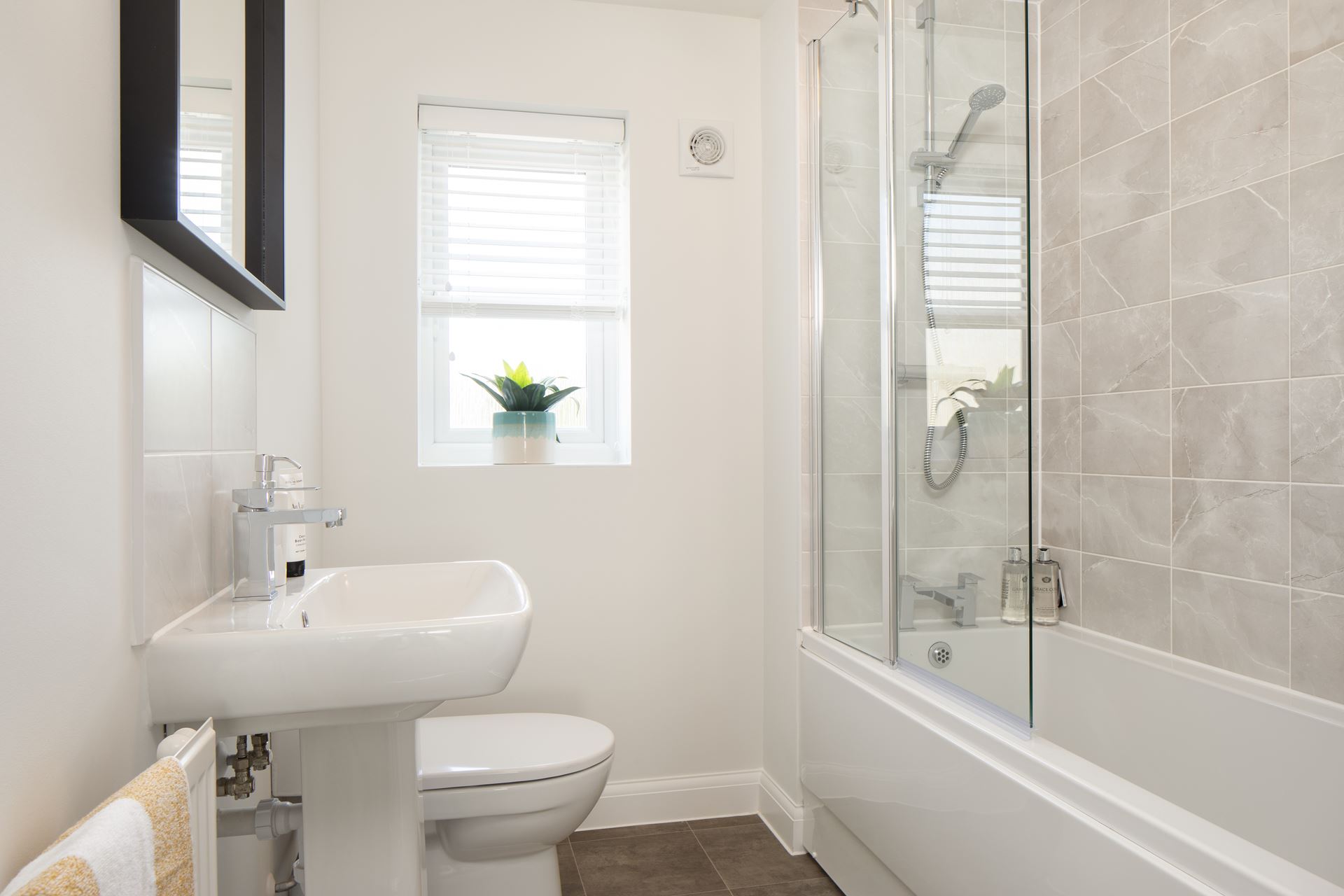 Image of the family bathroom in the Woodcote Show Home at Park Farm, Thornbury.