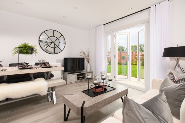 dining and family area with French doors to the garden