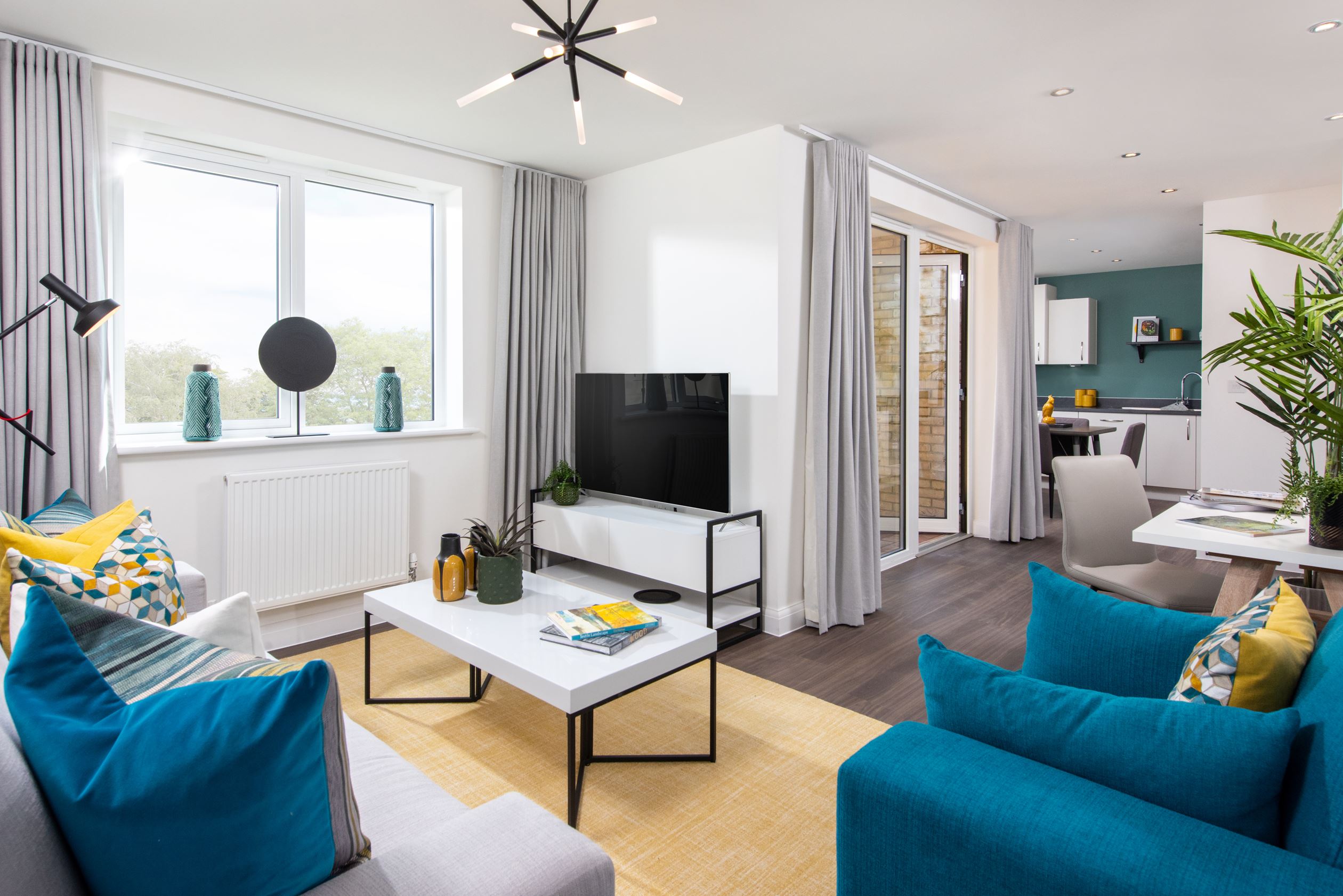 Open plan living space with french doors 