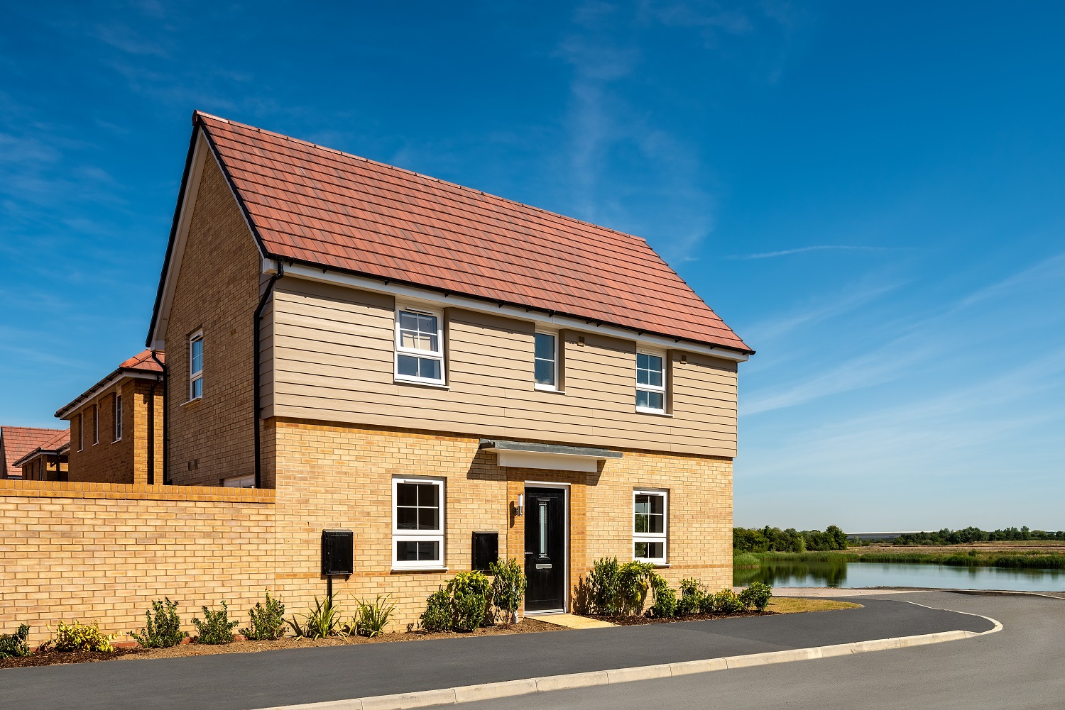 External of the three bedroom Moresby overlooking lake