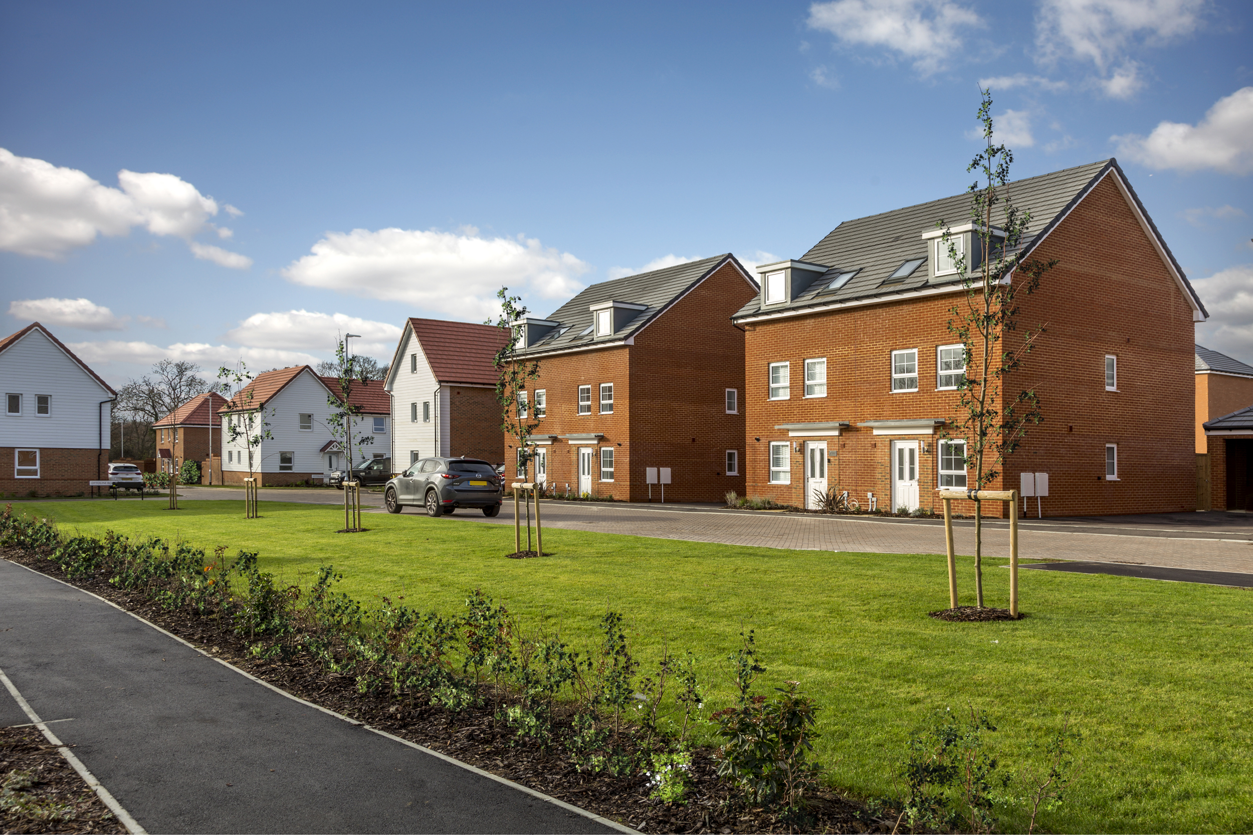 street scene overlooking green open space