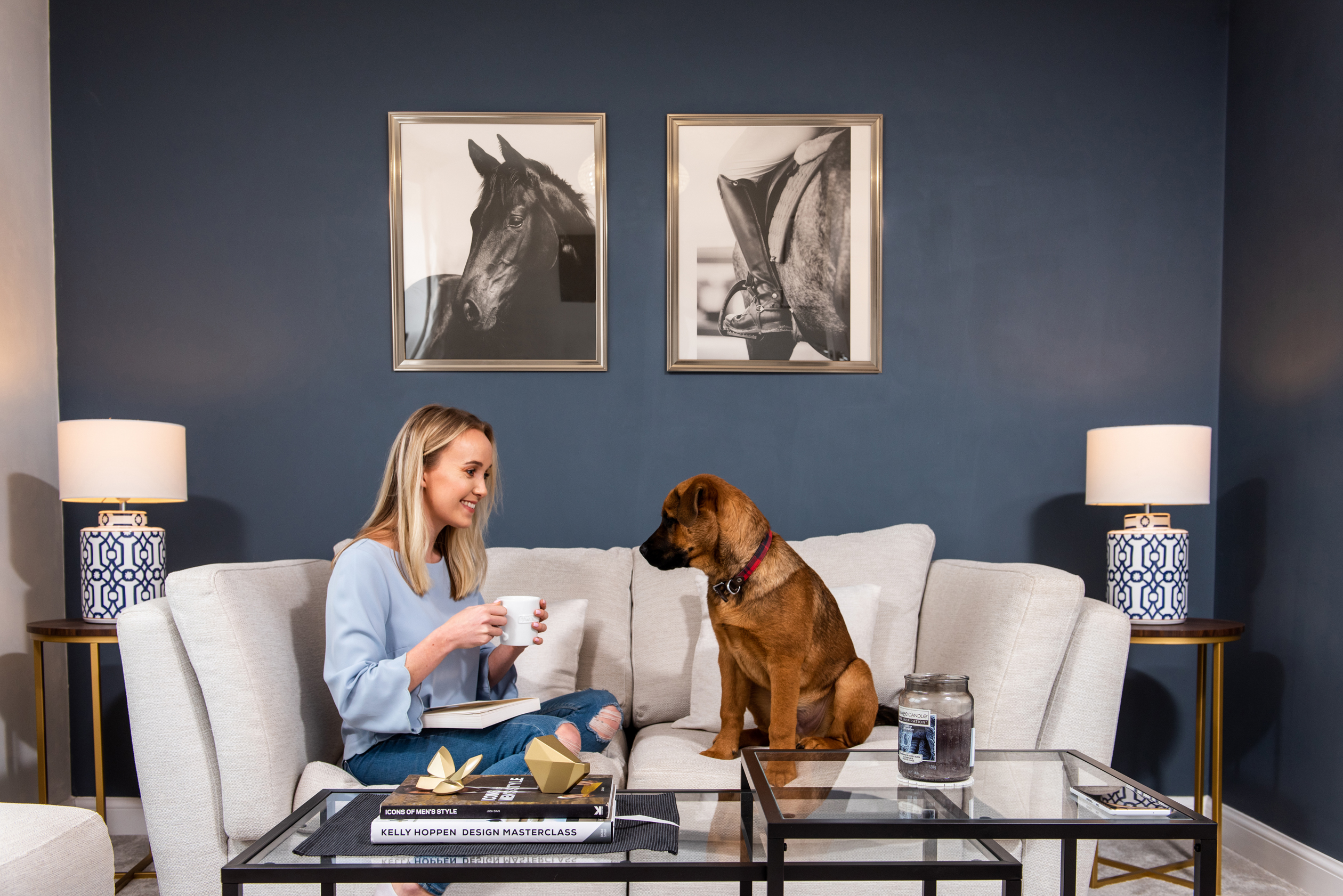 image of our customer and Instagram blogger @IndependtlyKate on her sofa with her dog 