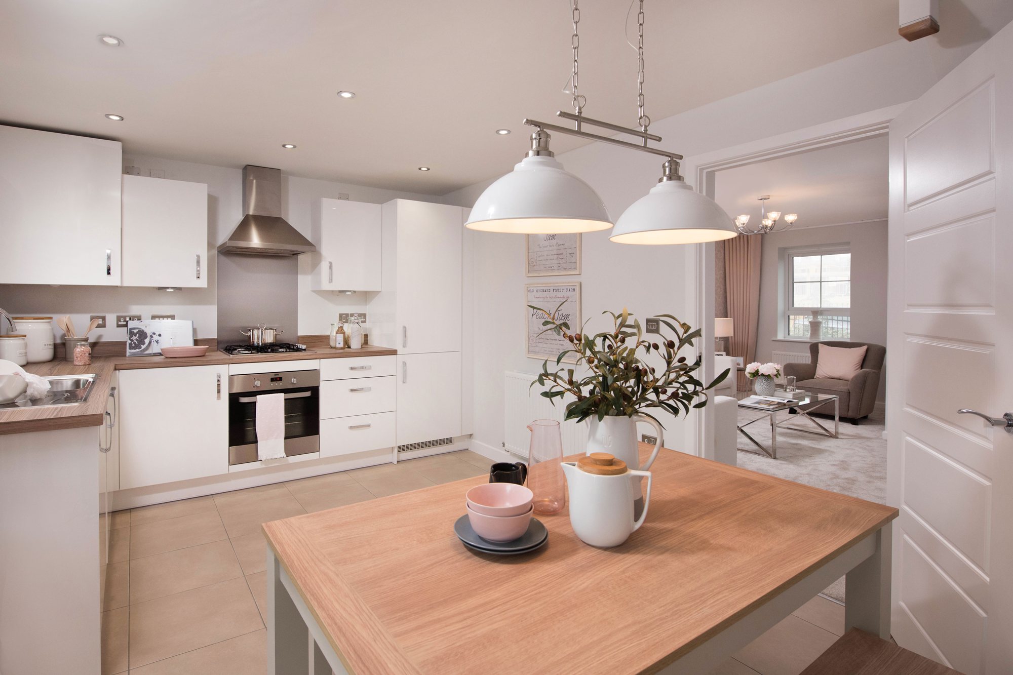 Maidstone kitchen showing dining area and open door into the lounge 