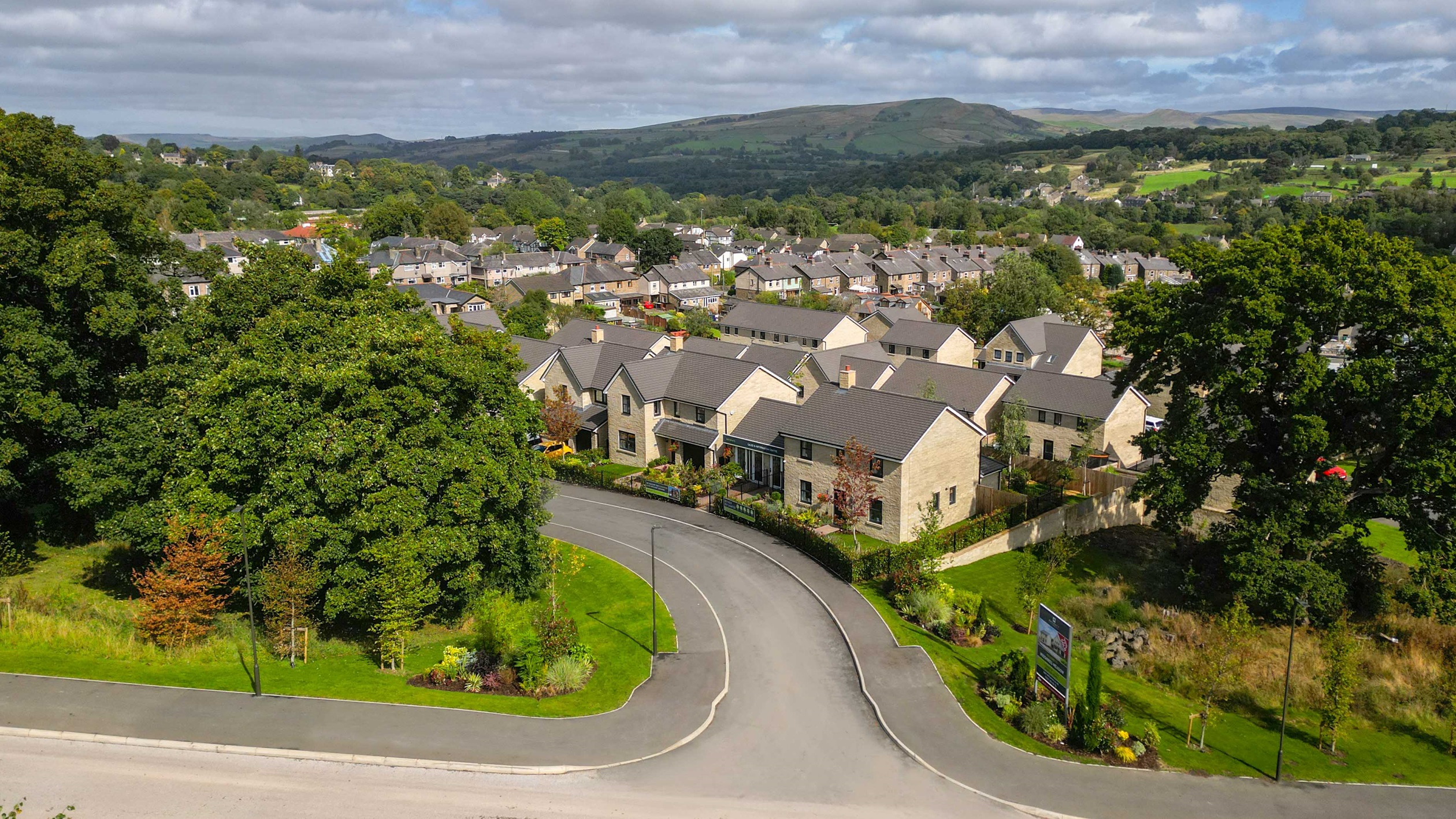 Midshires Meadow drone view into entrance 
