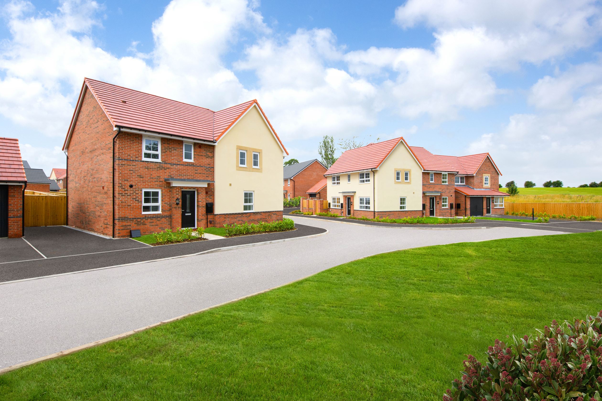 street scene at The Spinnings of the Folkestone, Ennerdale, Derwent housetypes with green open space to front aspect 