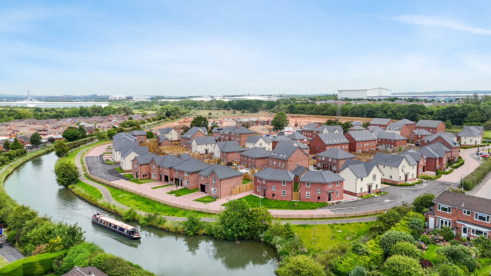 Waterside aerial view over the development 
