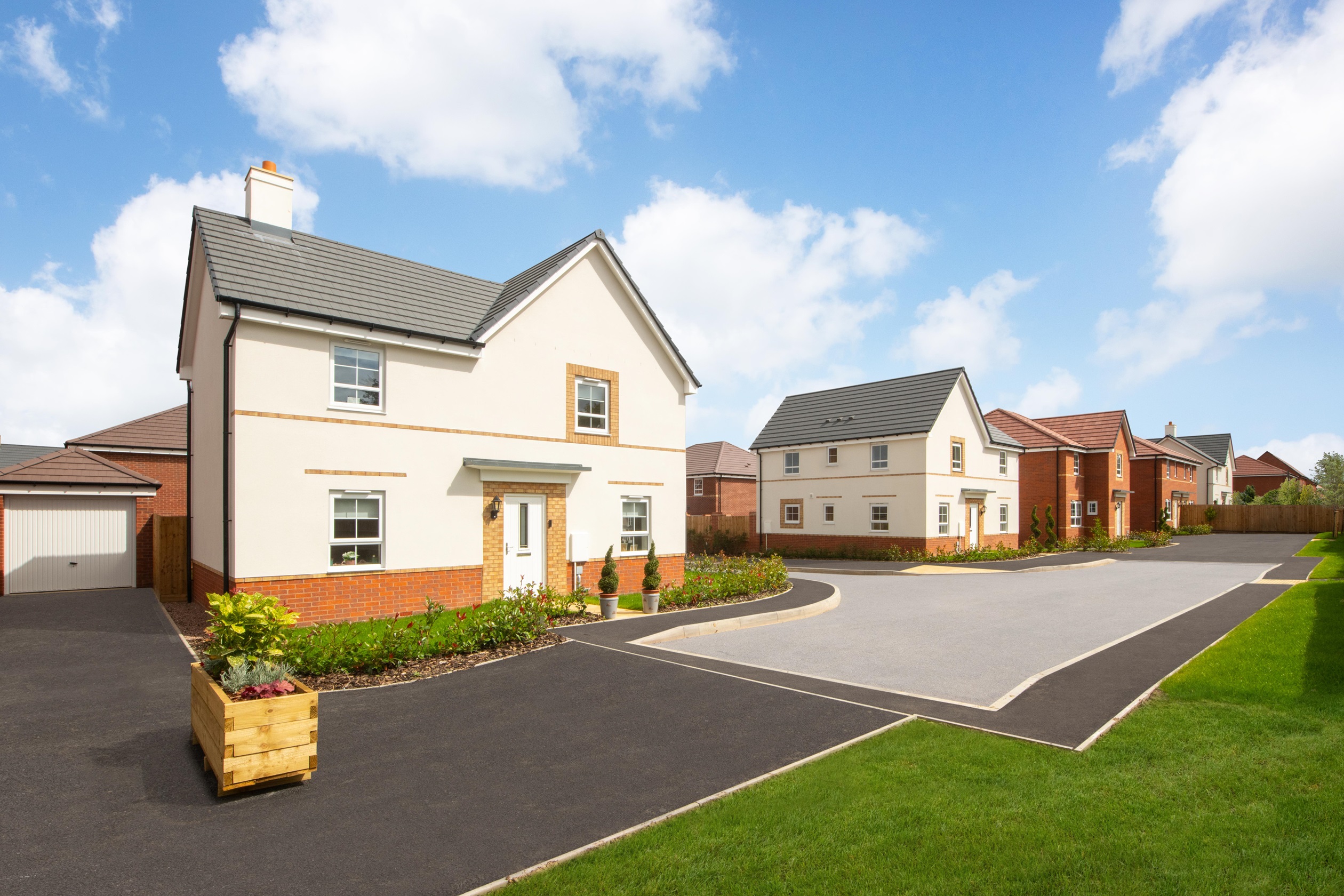 Exterior view of our 4 bed Alderney home in a render finish