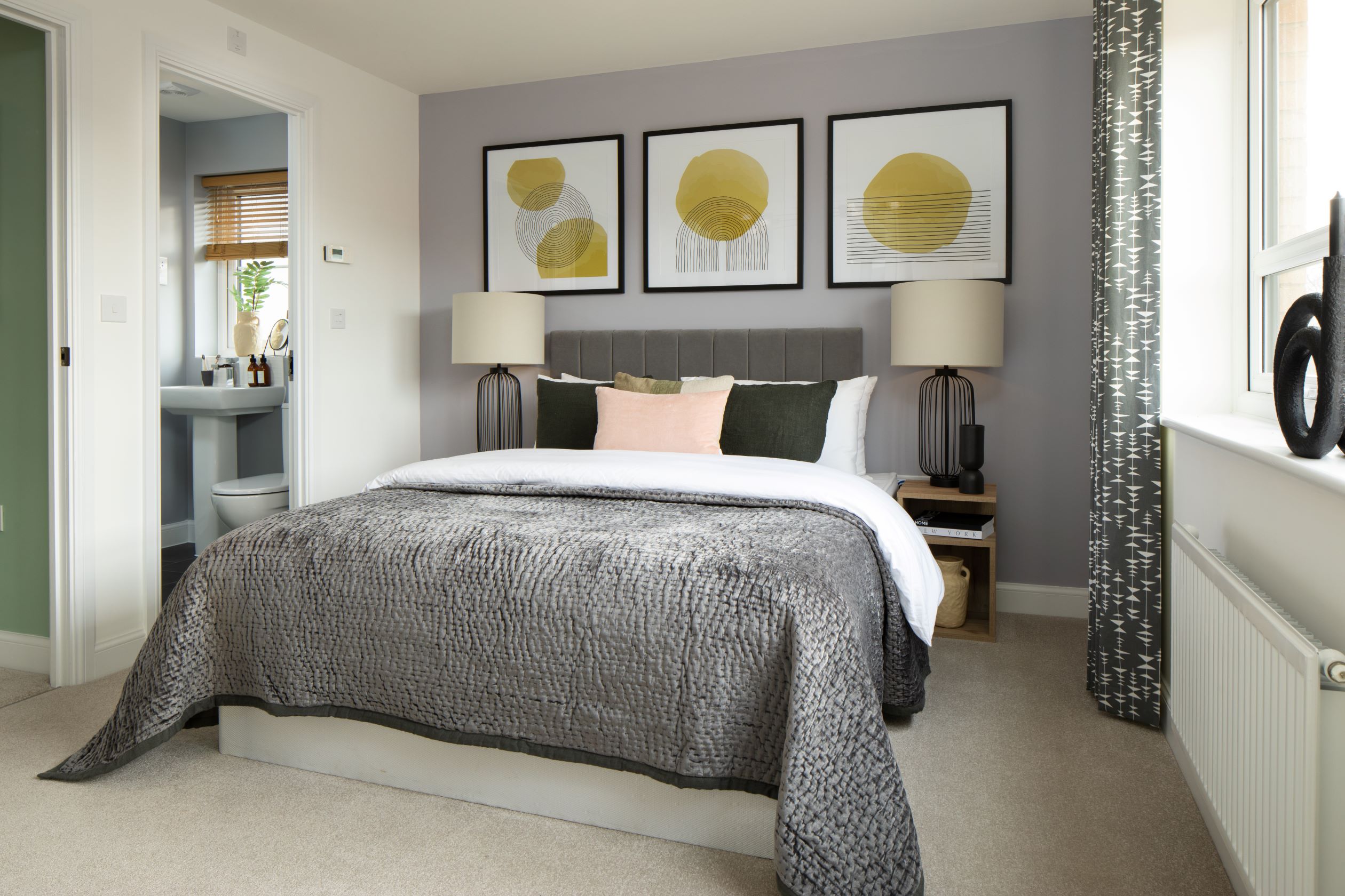 En suite main bedroom in the Kingsville. 4 bedroom home.