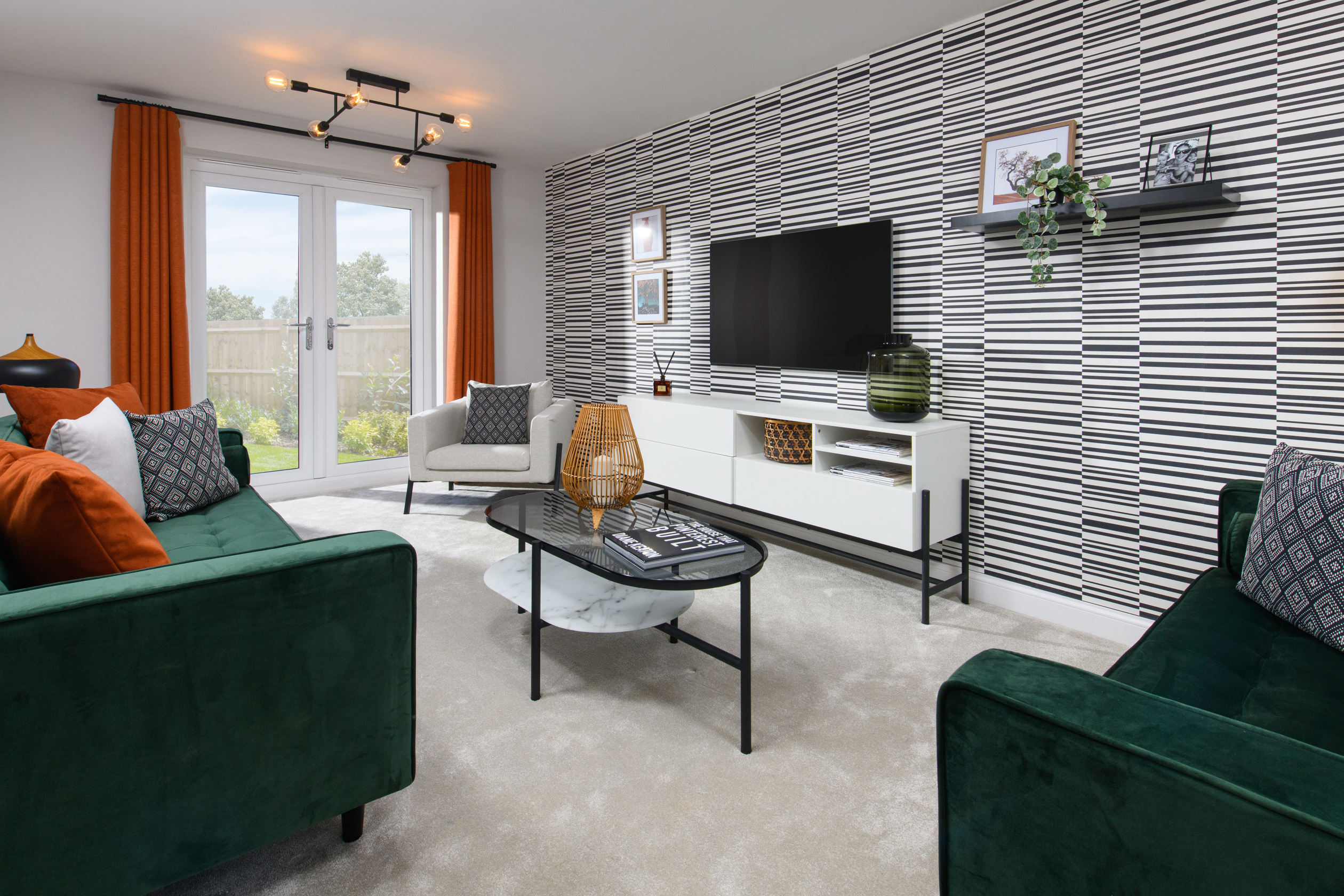 Inside 4 Bedroom Alderney lounge with French doors