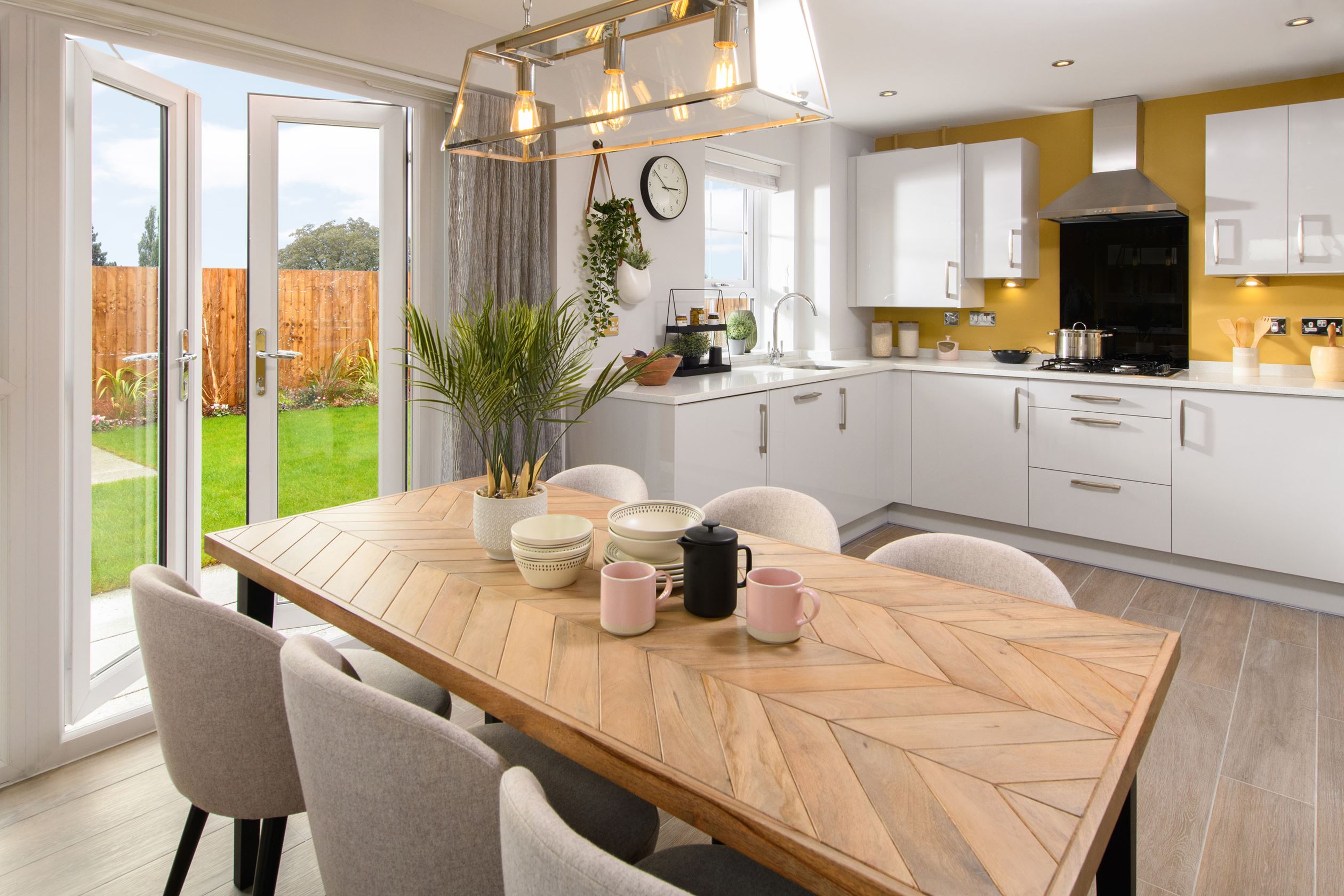 Open-plan kitchen/diner in Hesketh with French doors to gardenb