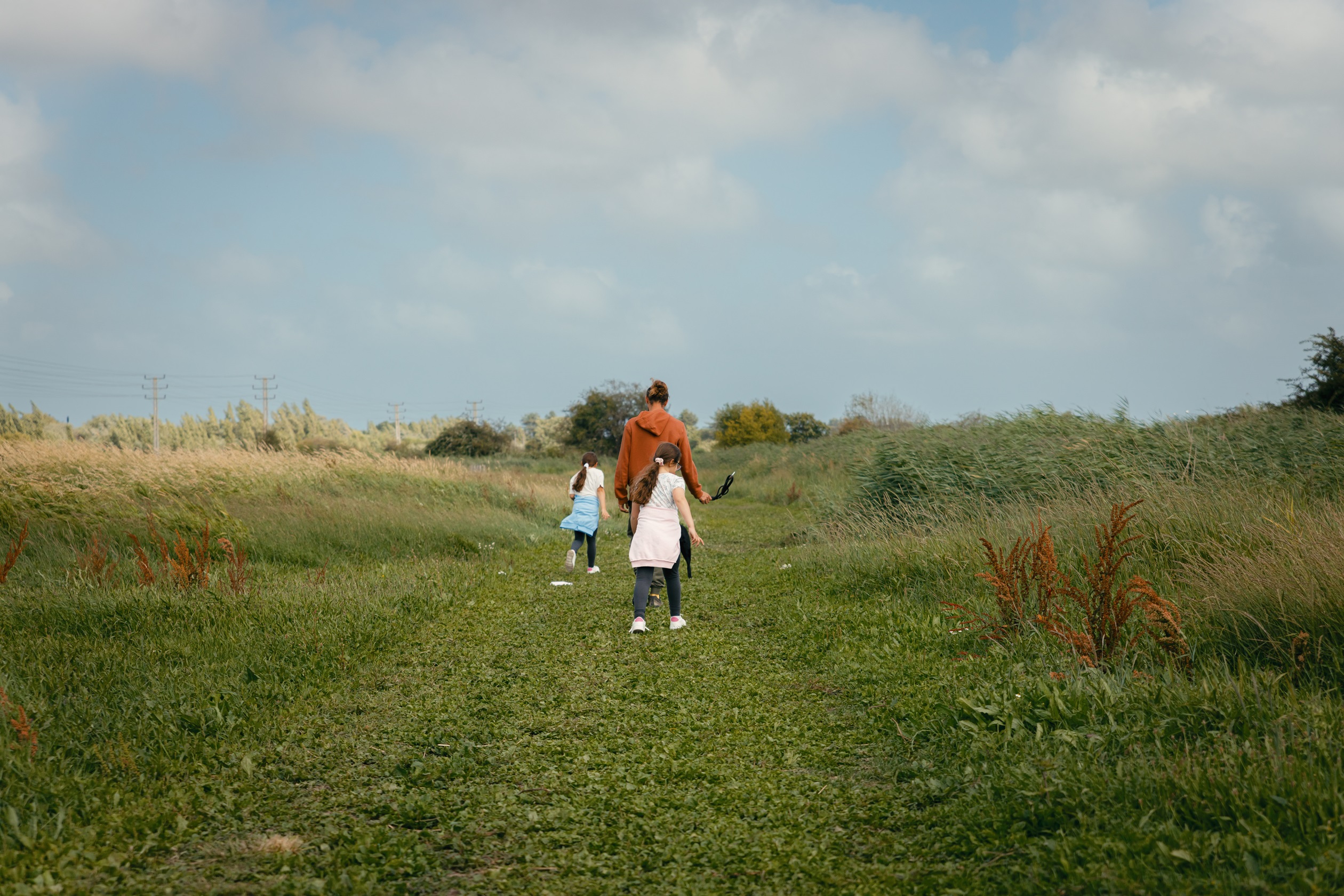 Local area image of people walking in bersted brooks nature reserve 