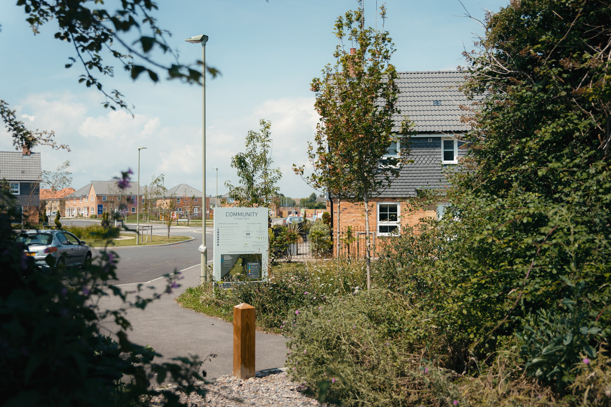 External shot of the pathway that leads from pebble walk directly to hayling billy trail