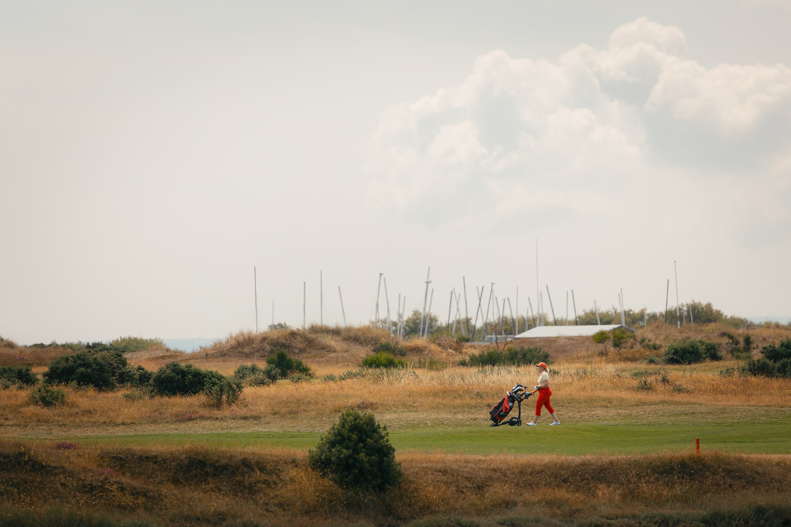 External shot of someone playing golf