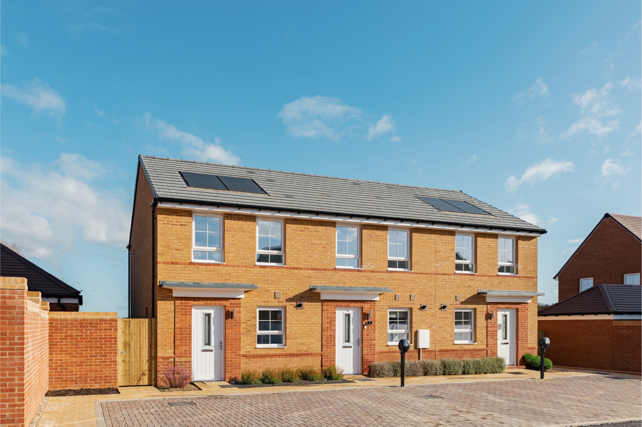 External shot of terraced denford at quarter jack park