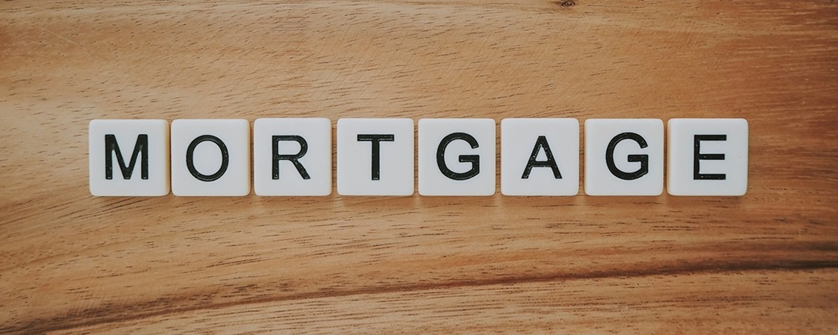 Tiles Spelling out Mortgae