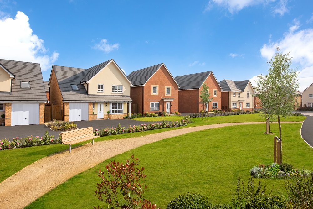 Row of Barratt homes with a pathway and green open space
