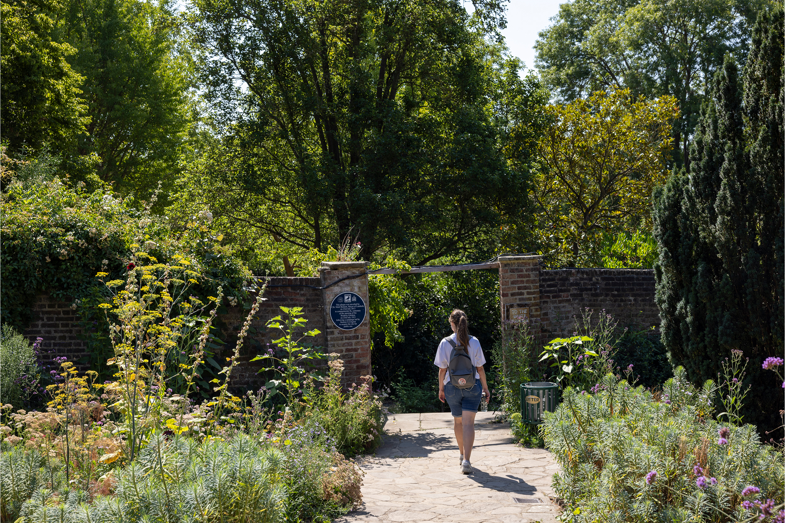 Person walking in walled gardens