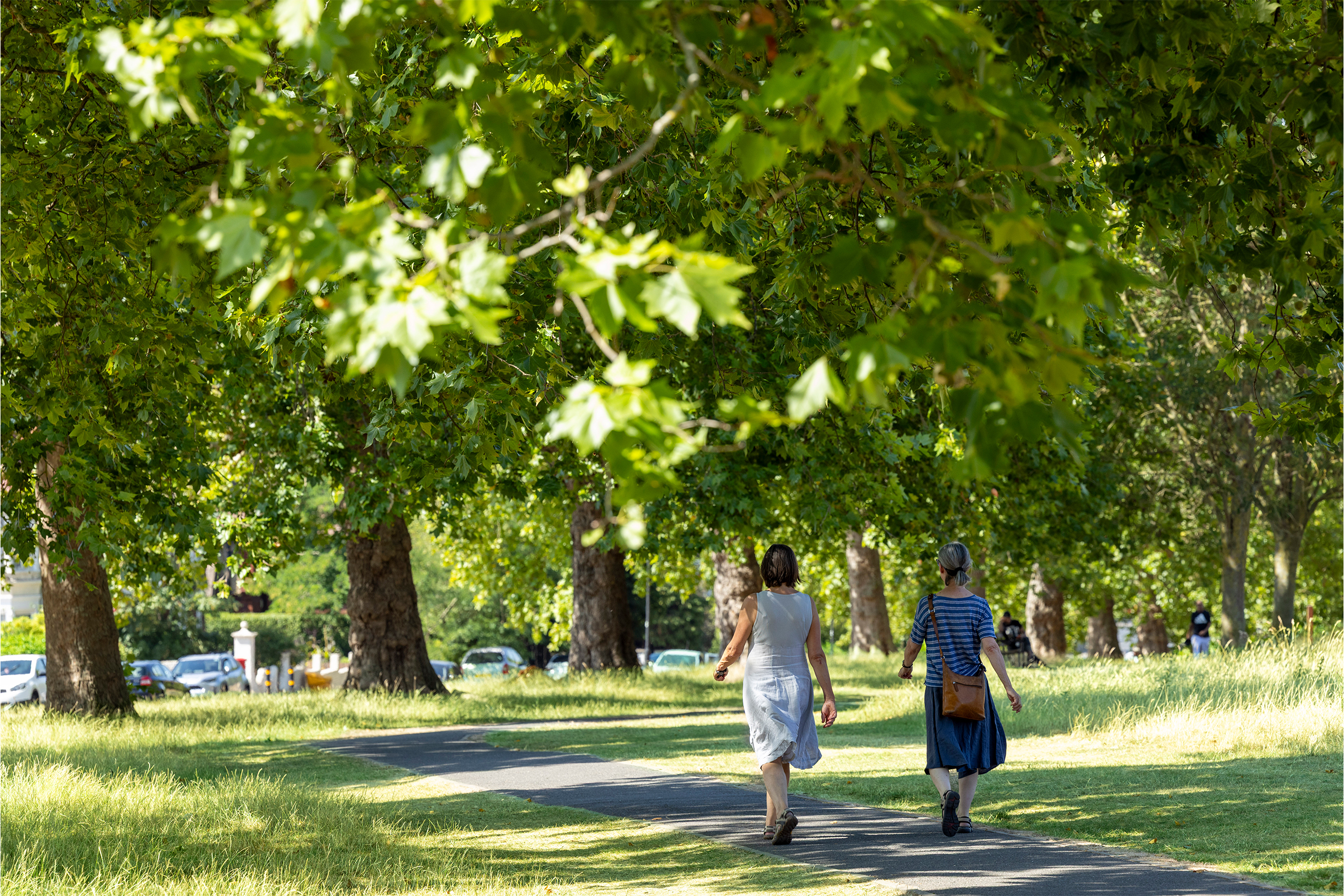 Two women walking in the park