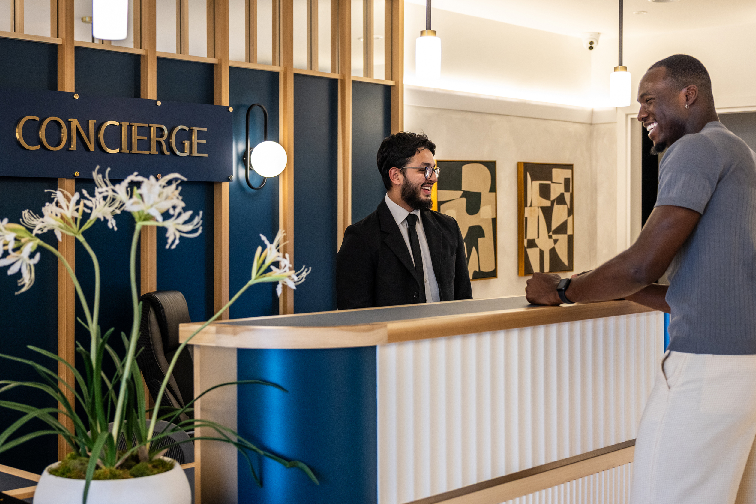 Concierge and man smiling