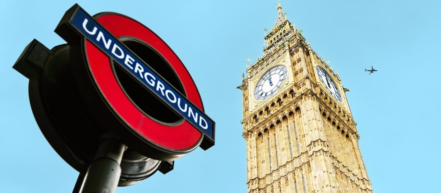 London plaque and Big Ben with blue sky background 